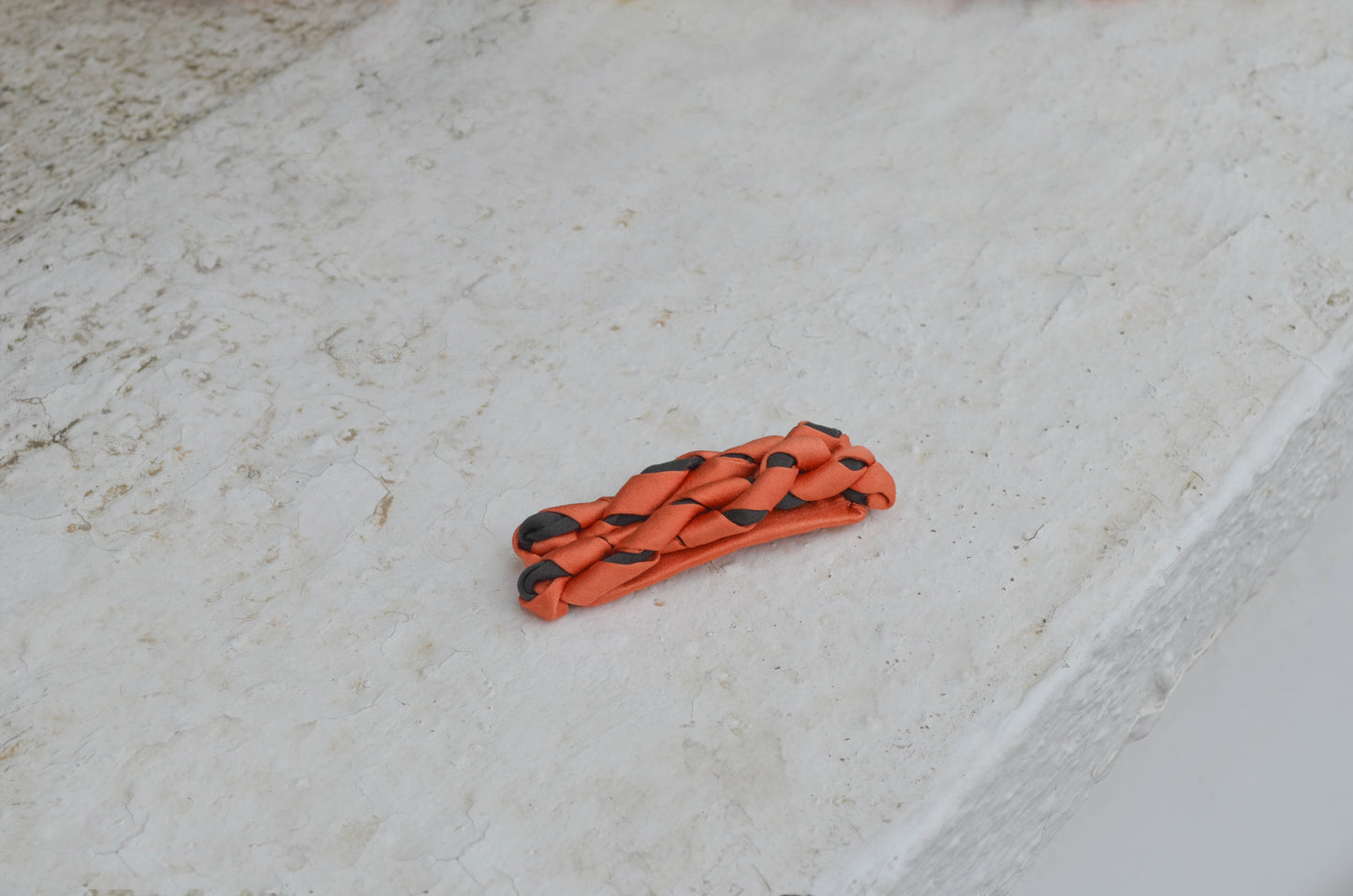 Groovy Vine Splash, Orange-Black twisted satin hair clip